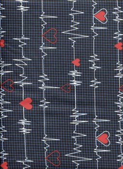 EKG-Aufzeichnung auf Schwarz mit blauem Raster